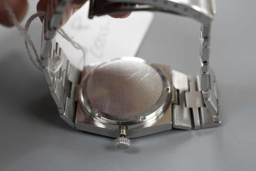 A gentlemans modern stainless steel Rotary manual wind? wrist watch, winder detached.